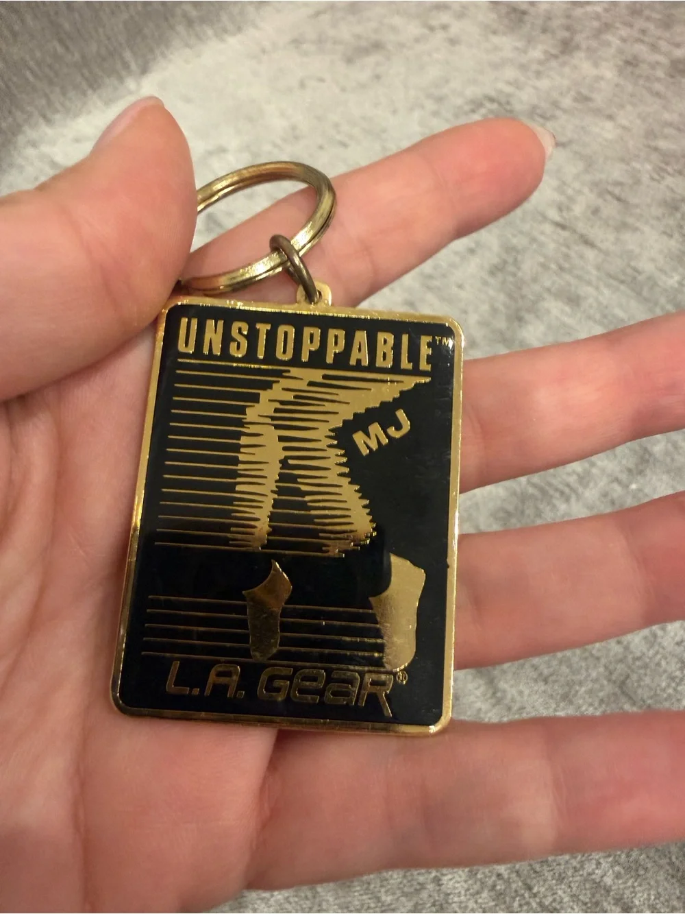 L.A. Gear Black and Gold 'Unstoppable' Rectangular Keychain